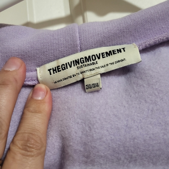 The Giving Movement Zipper Hoodie - Picture 2 of 4